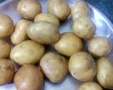 A picture of step 1 of Kashmiri Dum Aloo.