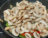 Foto del paso 5 de la receta: Bacalao con champiñones al ajillo