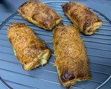 Foto del paso 3 de la receta: Napolitanas de jamón y queso rápido y sencillo con hojaldre