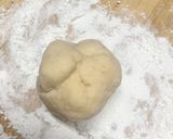 A picture of step 5 of Pull Apart Cheesy Bread.