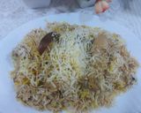 A picture of step 8 of Chicken white malai biryani.