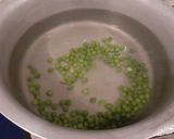 A picture of step 1 of White Rice with Green Peas🍚.
