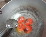 A picture of step 2 of Fried Tomato, Onion, and Garlic Chutney.