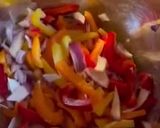 A picture of step 1 of One Pan Spicy Chicken, Veggie and Rice Bake.