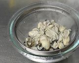 A picture of step 2 of Oyster pickled in Garlic Olive Oil.