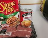 A picture of step 1 of Pork chops with apples and stuffing.