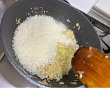 A picture of step 4 of Seafood Pan Rice.