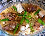 A picture of step 4 of Meat paella and chicken, fish.