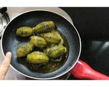 A picture of step 7 of Bharwa Karela.