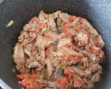 A picture of step 2 of Shawarma with onion 🌰 and tomato 🍅.