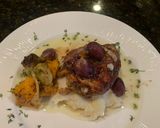 A picture of step 6 of Rosemary Chicken Thighs w Roasted Grapes and Smashed Parsnips.