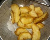 A picture of step 3 of Simple Rosemary potato wedges aaà.