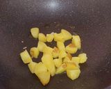 A picture of step 9 of Jhinge Aloo Posto.