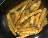 A picture of step 3 of Scrambled eggs and masala fries sandwich.