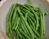 A picture of step 1 of Buttery Sautéed French Beans with sesame seeds.