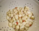 A picture of step 1 of Manx Queenies & Smoked Bacon In A Garlic Butter Sauce.