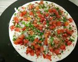 A picture of step 3 of Cheese Uttapam pizza style.