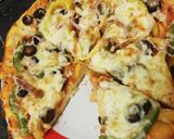 صورة لخطوة 5 من وصفة بيتزا ومعجنات بالعجينه القطنية 😋