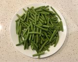 A picture of step 1 of Pork Green Bean Braised Soba Noodles.