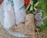 A picture of step 8 of Hot and spicy chicken paratha roll.