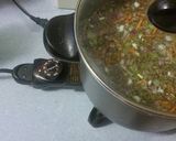 A picture of step 13 of creamy chicken rice soup.