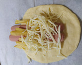 Foto del paso 3 de la receta: Saquito de Frankfurt y patatas