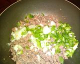 A picture of step 5 of Homemade pizza with minced beef and cheese topping.