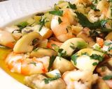 Foto del paso 6 de la receta Salteado de champiñones con ajetes y langostinos