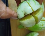 A picture of step 1 of Eggplant or brinjal rice.