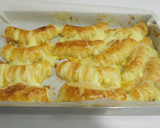 Foto del paso 17 de la receta: Gusanos de hojaldre rellenos de crema