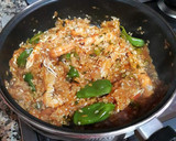 Foto del paso 10 de la receta: Arroz con jugos de cigalas, almejas y pimientos tipo padrón