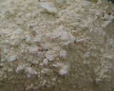 A picture of step 1 of Besni masala prahta with tomato souce.