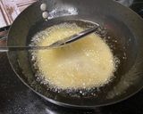 A picture of step 5 of Radhaballavi (stuffed puris).