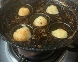 A picture of step 3 of Sabudana Wada in appe pan.