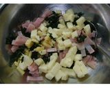 Foto del paso 3 de la receta: Empanadillas con verdeo, jamón, queso y huevo batido