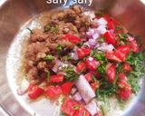 A picture of step 2 of Foul Medames with Charcoal.