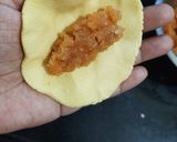 A picture of step 6 of Palm dumplings stuffed with sweetened coconut.