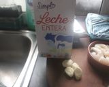 Foto del paso 1 de la receta: Calabacín relleno de puré con gambas y jamón