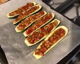 Une image de l'étape 4 de Courgettes farcies jambon tomates emmental et origan.