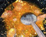 A picture of step 12 of Khatay aloo.