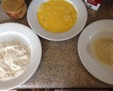 A picture of step 2 of Chicken Parmigiana.