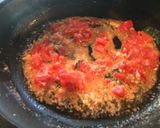 A picture of step 17 of Farewell Parmesan Crusted Chicken w/light Basil, Tomato, Scampi Cream Sauce.