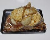 A picture of step 2 of Oven Baked Drumettes and Onions.