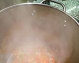 A picture of step 2 of Abigaile's Étouffée served with rice.