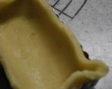 A picture of step 12 of How to Blind-Bake Pate a Fonce & Tart Crusts.