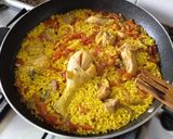 A picture of step 8 of Chicken and Squid Paella.