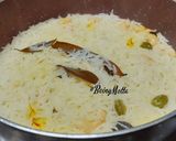 A picture of step 5 of Orange Pulao.