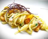 A picture of step 6 of Linguine with Swordfish, Yellow Grape Tomatoes, Eggplant, and Crispy Fried Eggplant Skin.