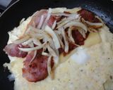 A picture of step 7 of My Folded Omelette with Bacon, Onion and Cheese Inside, Topped with Grated Mozzarella 😘.