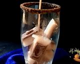 A picture of step 16 of Choco vermicelli mocktail with cocoa cubes.
